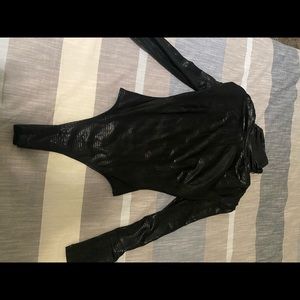 Skirt and body suit.